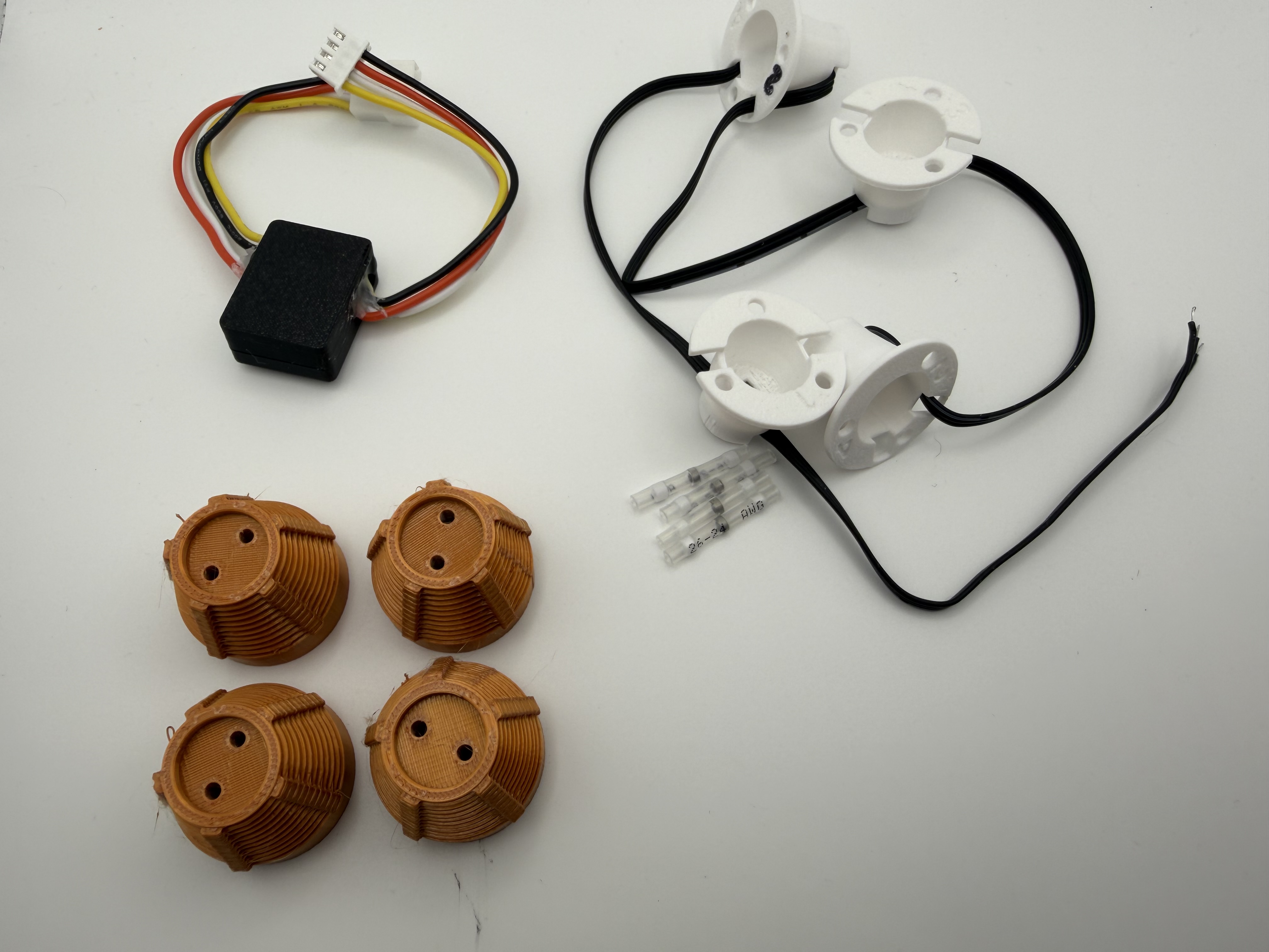 Complete Recessed Emitter Devices kit with four reflector cups, controller, wiring, and emitter cones