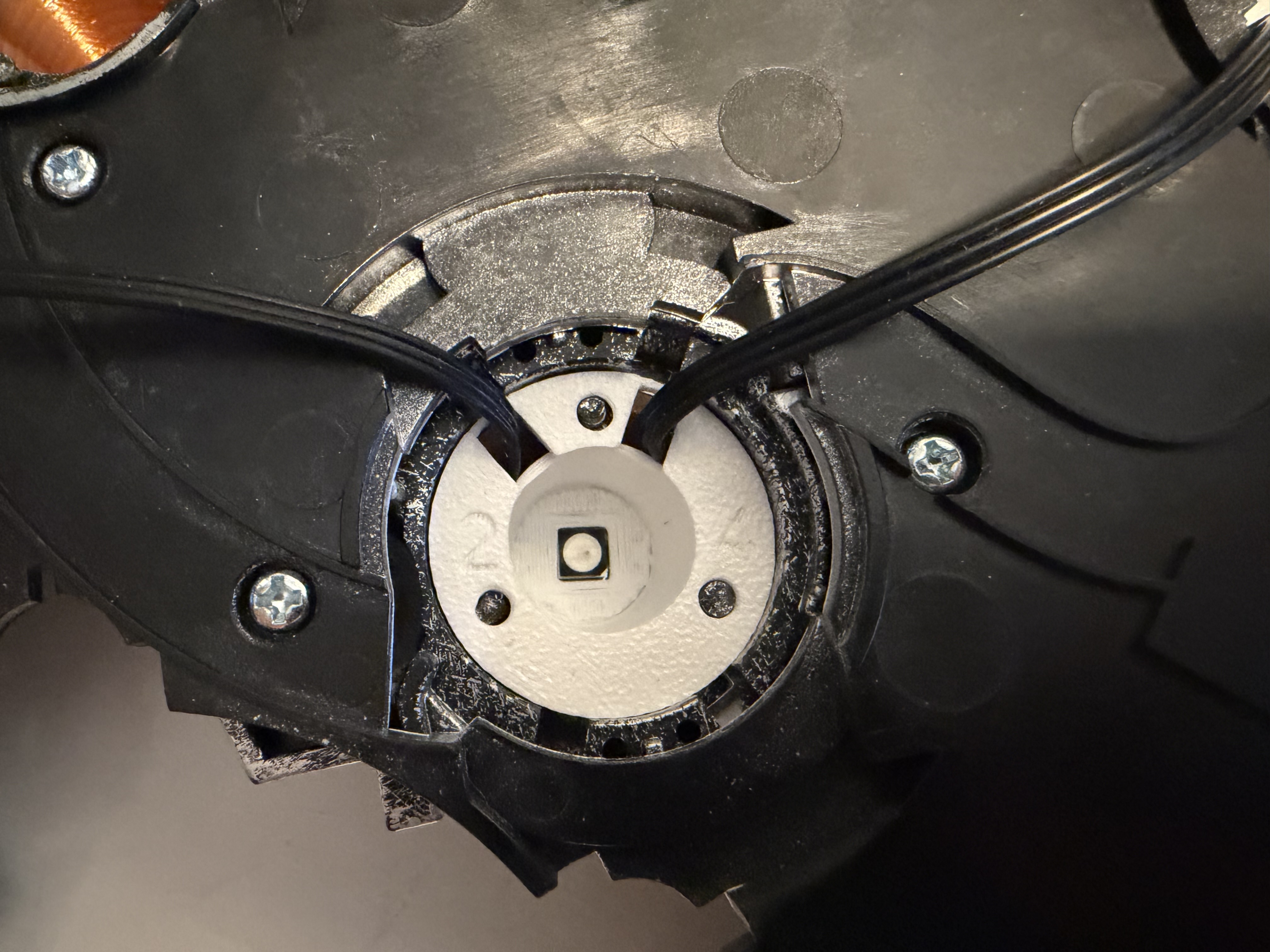 Reflector cup 2 installed with its wires routed through the lid