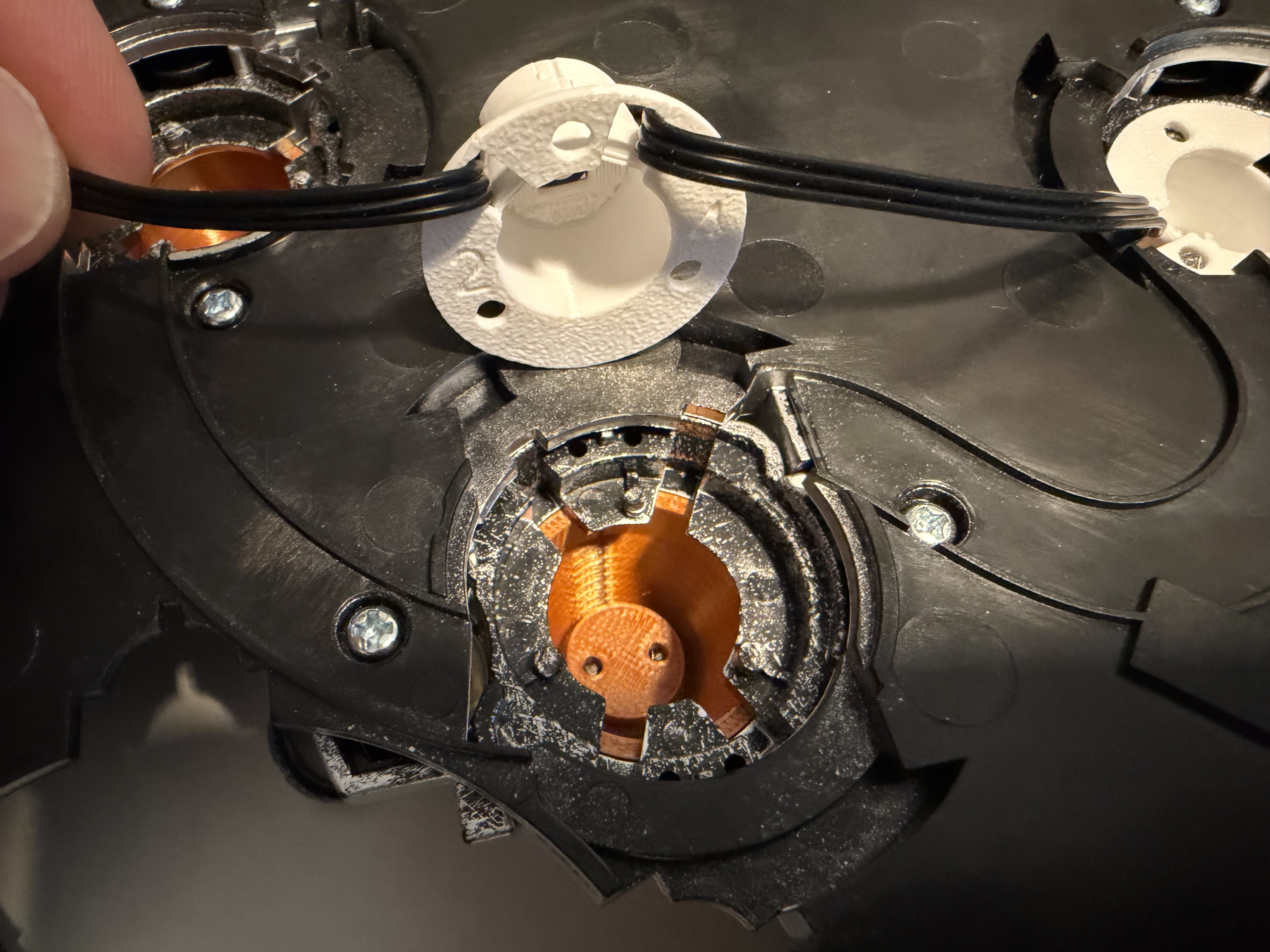 Reflector cup 2 being positioned over its cyclotron opening