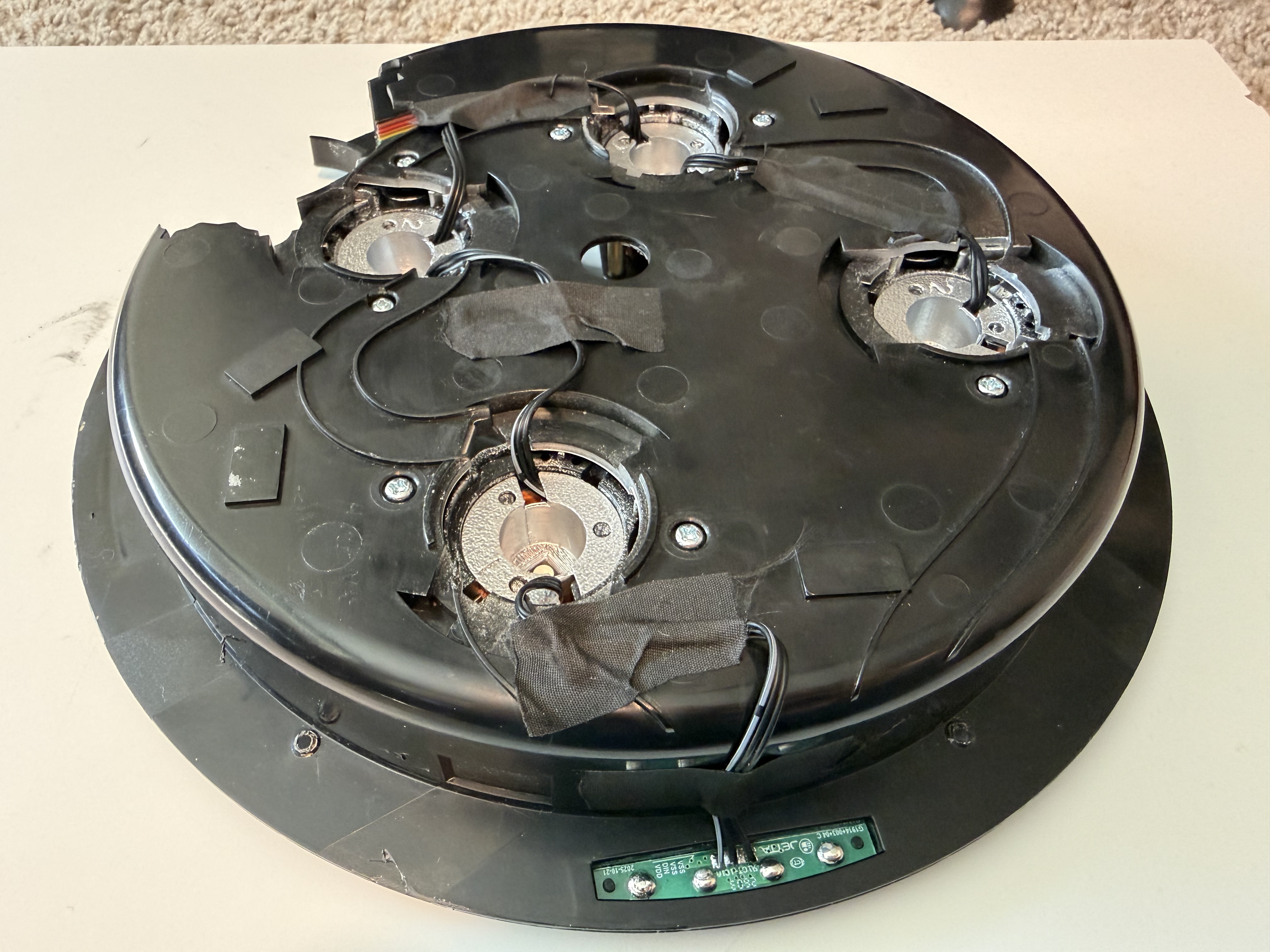 Completed cyclotron lid installation with direct-solder wiring and taped wires